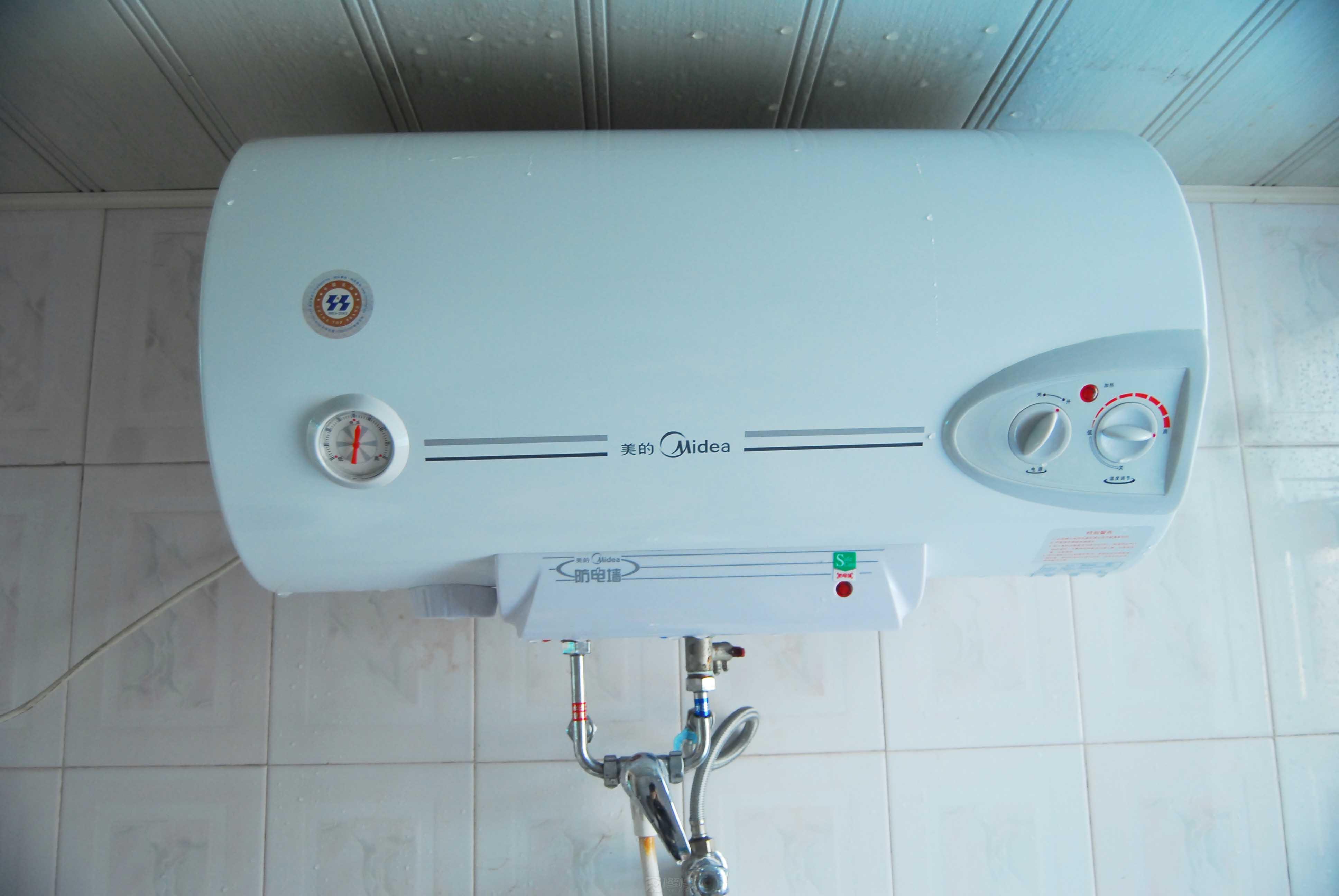 1.美的热水器热水器加热减压阀时滴水是什么原因??(图2) 热水器减压阀一直滴水怎么解决_减压稳压阀和流量控制阀的区别_减压稳压阀工作原理